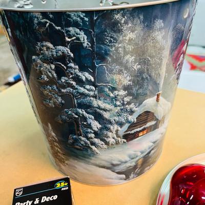 Christmas tin full of colored light bulbs
