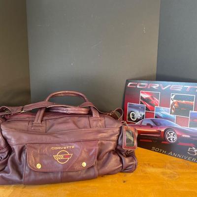 Lot 41-A. Corvette Leather Duffel Bag & Metal Poster