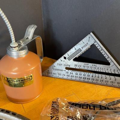 Lot 54. Garage Misc with Oil Can & Speed Square