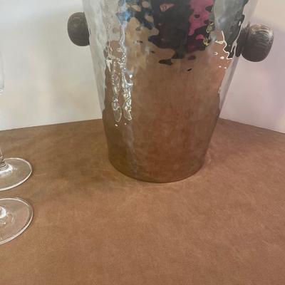 Lot 161. Hammered Metal Ice Bucket and Champagne Flutes