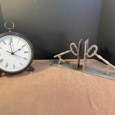 Lot 198. Pottery Barn Clock & Bookends