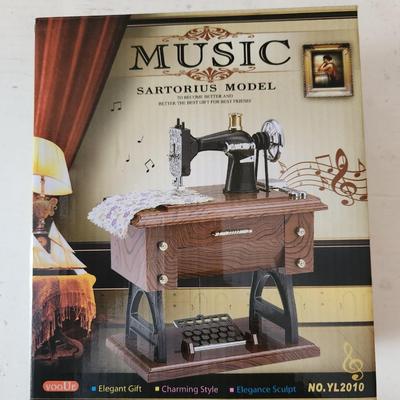 Sewing machine music box