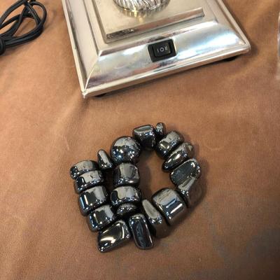 Lot 249. Desk Lamp, Clock, Wastebasket and Magnetic Fidget Sculpture