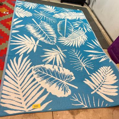 Tropical woven area mat