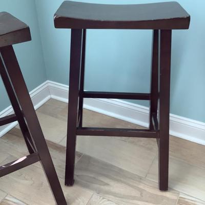 2 wooden bar stools, darker brown, 1 rung, 29â€H, 17 1/2â€x9â€seat, base 16â€x18â€