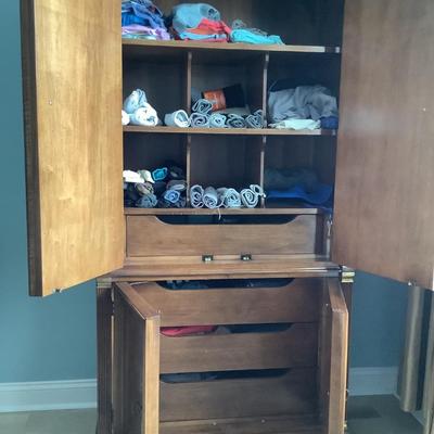 White furniture co wardrobe, 4 door, top shelf, 6 cubby, one divided drawer, 3 drawers on bottom, 78â€H, 36â€W, 18â€depth