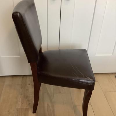 Faux leather chair with wear38â€H 18â€W 17â€seat depth, 19â€ seat height