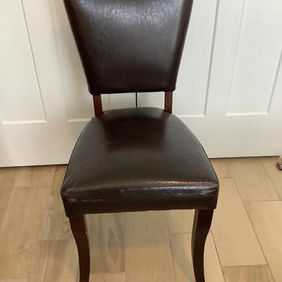 Faux leather chair with wear38â€H 18â€W 17â€seat depth, 19â€ seat height