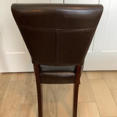 Faux leather chair with wear38â€H 18â€W 17â€seat depth, 19â€ seat height