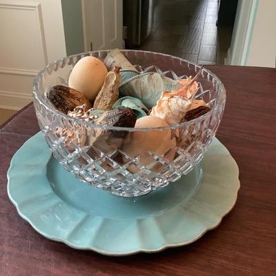 Light blue charger with glass bowl, and decor