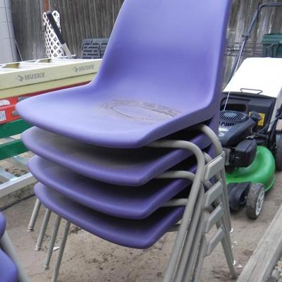 FOUR STACKABLE PURPLE CHAIRS