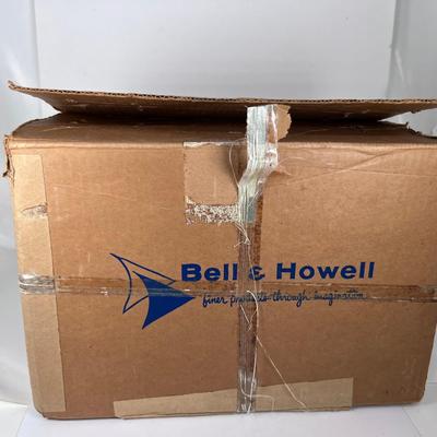 Bell and Howell headliner Proector and instructions