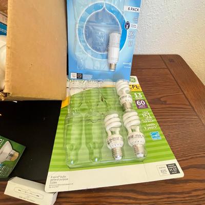 Box of new light bulbs