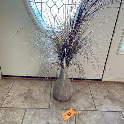 Vase with grass decoration
