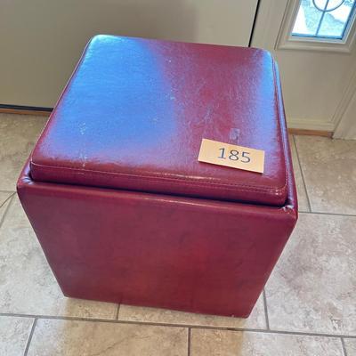 Red vinyl storage stool