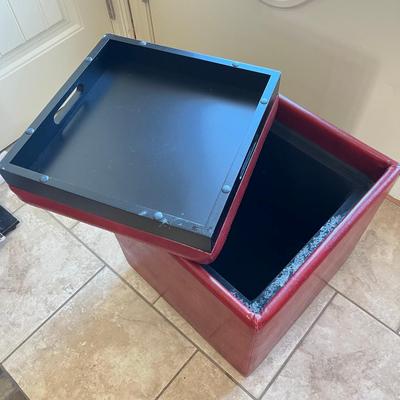 Red vinyl storage stool