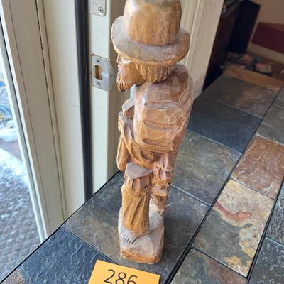 Wood carving of a peasant Mexican