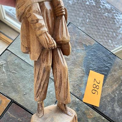 Wood carving of a peasant Mexican