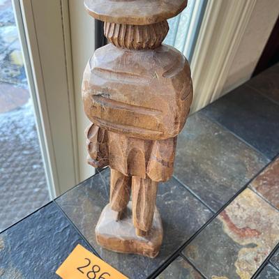 Wood carving of a peasant Mexican