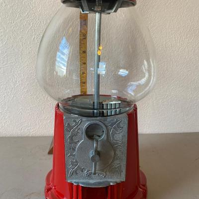 Vintage metal and glass gumball machine