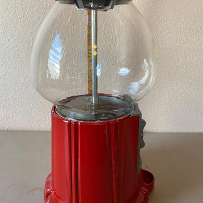 Vintage metal and glass gumball machine