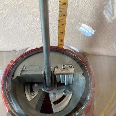 Vintage metal and glass gumball machine
