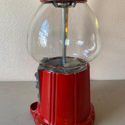 Vintage metal and glass gumball machine