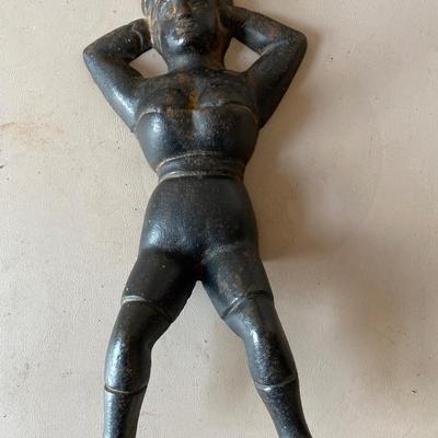 Vintage cast-iron, naughty Nellie boot jack