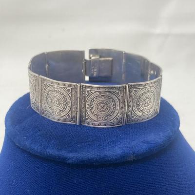 Sterling Silver Aztec Calendar, hinged bracelet. 26.78 grams.