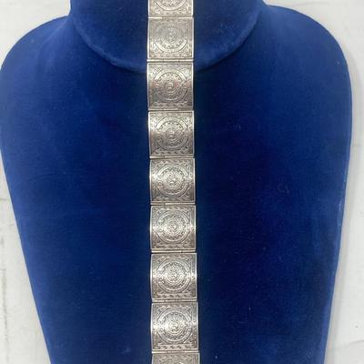 Sterling Silver Aztec Calendar, hinged bracelet. 26.78 grams.