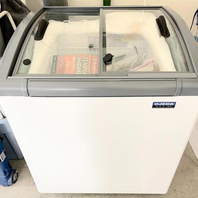 LOT 11  OJEDA MODEL NBH-28 COMMERCIAL MOBILE CHEST FREEZER