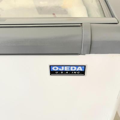 LOT 11  OJEDA MODEL NBH-28 COMMERCIAL MOBILE CHEST FREEZER