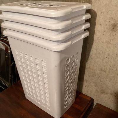 Four Laundry Baskets With Lids