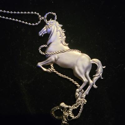 Silver horse charm
