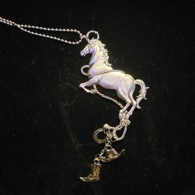 Silver horse charm