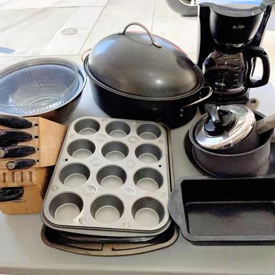LOT 24  MISC. GROUP OF KITCHEN POTS & PANS MR COFFEE BAKING SHEETS KNIFE BLOCK