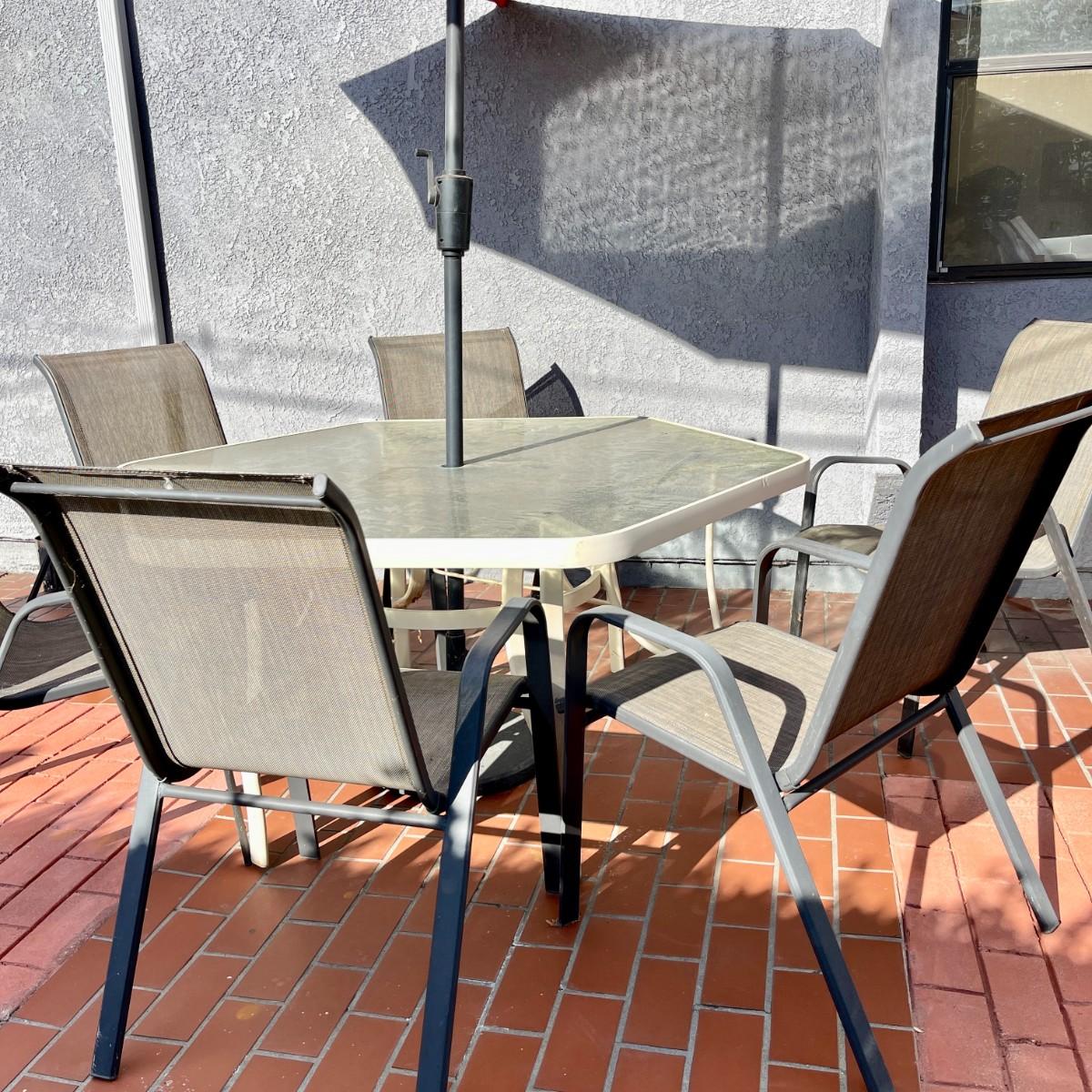 LOT 27 OUTDOOR HEXAGON GLASS TOP PATIO TABLE 6 CHAIRS & RED MARKET UMBRELLA  | EstateSales.org