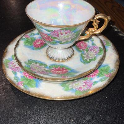 Vintage saucers and cup.  Add in Japan