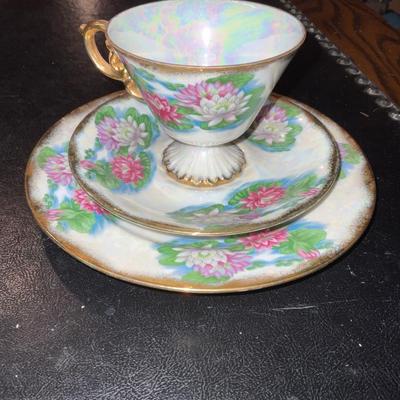 Vintage saucers and cup.  Add in Japan