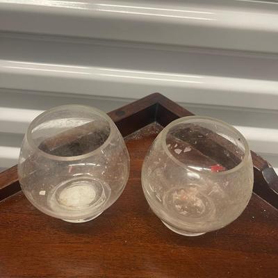 2 round glass candle holders. Almost 4” high
