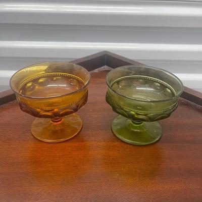 Vintage.  Two dessert dishes. One green and one amber