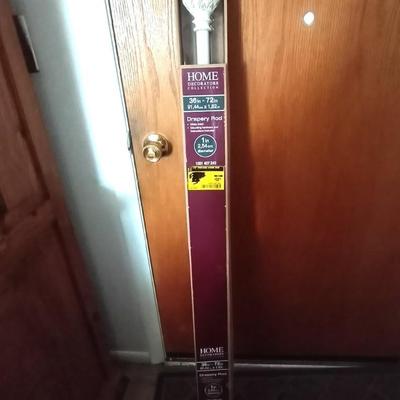 TWO NEW DRAPERY RODS
