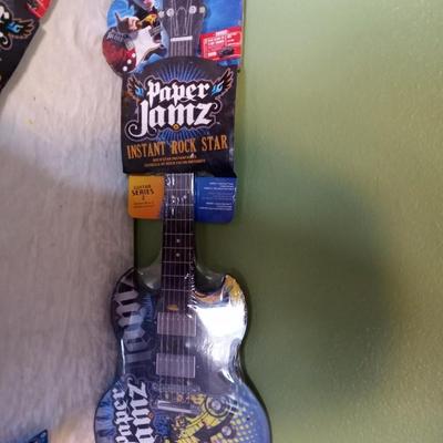 TWO VINTAGE CARDBOARD PAPER JAMZ GUITARS AND STRAP (STILL SEALED)