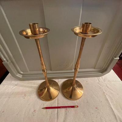 Pair of tall brass candlesticks