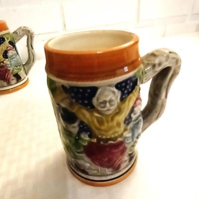 FOUR BEER STEINS