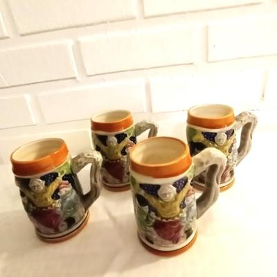 FOUR BEER STEINS