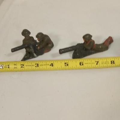 LOT 74  TWO VINTAGE METAL TOY SOLDIERS