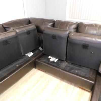 LARGE BROWN VINYL COVERED SECTIONAL