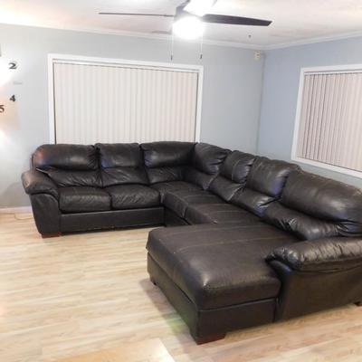 LARGE BROWN VINYL COVERED SECTIONAL