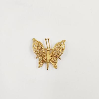 VINTAGE MONET GOLD TONED DOUBLE WINGED BROOCH